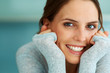 Closeup of pretty cheerful young woman