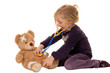 Kind mit Stethoskop als Arzt. Kinderarzt untersucht Patienten