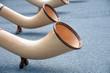 three alphorns