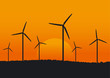 Wind turbine plant over sunset