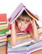 Child reading open book on table. Child reading open book on table.
