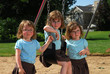 Triplets on the swingset