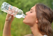 Young woman drinking water Young woman drinking water