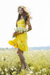 Foto: Beautiful girl in green field Beautiful girl in green field