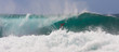 Fearless Surfer Riding a Huge Wave