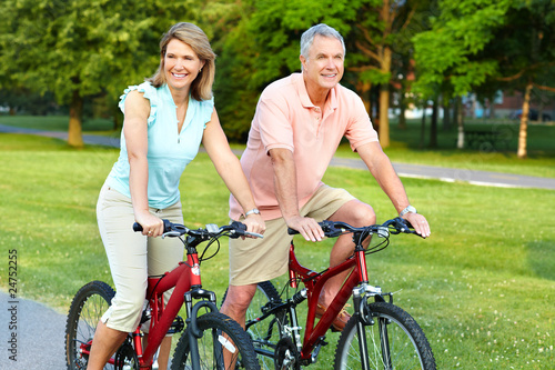 Photo: senior couple cycling senior couple cycling