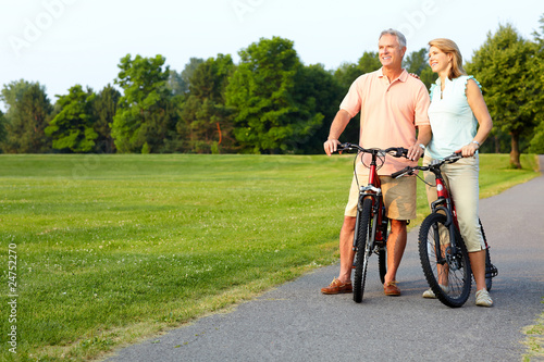 Photo: senior couple cycling senior couple cycling