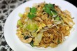 Fried kuey teow (flat rice noodles)