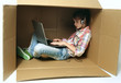 Little girl and laptop in the box. Little girl and laptop in the box.
