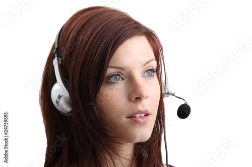 Photo: young woman with headset (white background) young woman with headset (white background)