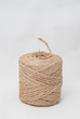 a roll of hemp rope isolated on white background.