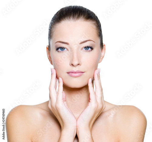 Photo: Face of a sexy beautiful young woman with clean skin Face of a sexy beautiful young woman with clean skin