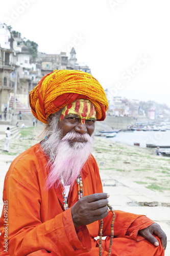 Photo: Portrait of a old Sadhu at the ghats in Varanasi, India. Portrait of a old Sadhu at the ghats in Varanasi, India.