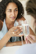Photo: Adult couple toasting champagne glasses Adult couple toasting champagne glasses