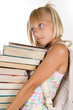 Back to School.Little Schoolgirl with heavy books