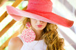 young women in a red hat close-up young women in a red hat close-up
