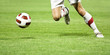 Soccer player running after the ball