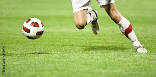 Photo: Soccer player running after the ball Soccer player running after the ball