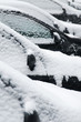 Close up of snow covered car from side