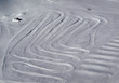 Winding snow road for skiers Winding snow road for skiers