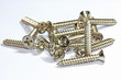 silver screws on white background silver screws on white background