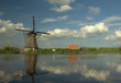 Photo: Kinderdijk :reflected windmill with clouds Kinderdijk :reflected windmill with clouds