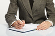 woman’s hand holding a pen woman’s hand holding a pen