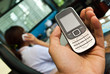 Hand holding a cell phone