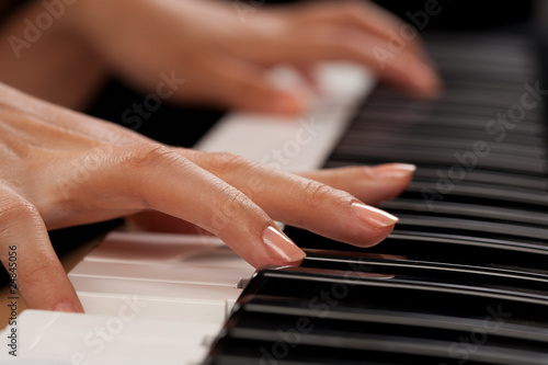 Photo: Piano player closeup on hands Piano player closeup on hands