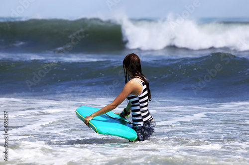 Photo: surfer - woman surfer - woman