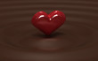 red heart on chocolate background