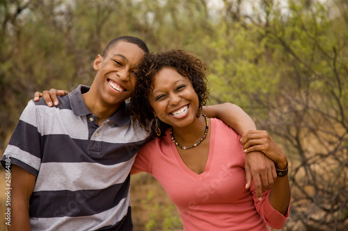 Photo: Happy African-American family outside Happy African-American family outside
