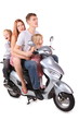 Father, mother and children is sitting on motorcycle. Isolate