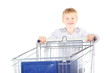 boy near shoping basket. focus on boy's face. isolated.