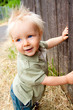 Young Boy by Fence Young Boy by Fence