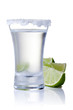 shot glass filled with clear cold alcohol shot glass filled with clear cold alcohol