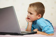 Schoolboy to laptop