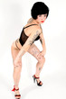 Photo: Young model with tattoos in lingerie Young model with tattoos in lingerie