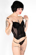 Photo: Young model with tattoos in lingerie Young model with tattoos in lingerie