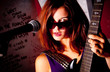 Photo: Girl with a guitar and microphone Girl with a guitar and microphone