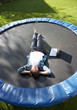 Photo: Young Man Relaxing On Trampoline With Laptop Young Man Relaxing On Trampoline With Laptop
