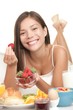 Young woman eating breakfast