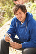 Photo: Young Man Relaxing With Thermos Flask In Autumn Landscape Young Man Relaxing With Thermos Flask In Autumn Landscape