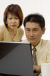 Photo: Asian couple working together Asian couple working together