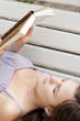 Beautiful girl reads book