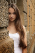 Closeup portrait girl posing on urban background.