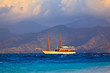 Vintage Frigate sailing on sunset