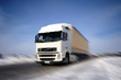 Speed yellow truck runing on the road Speed yellow truck runing on the road