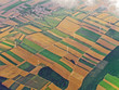 aerial view of farmland with windmills