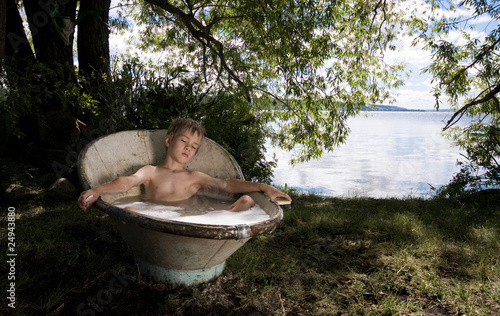 Photo: Retro Bathtub Boy Sleeps in Sunshine Retro Bathtub Boy Sleeps in Sunshine